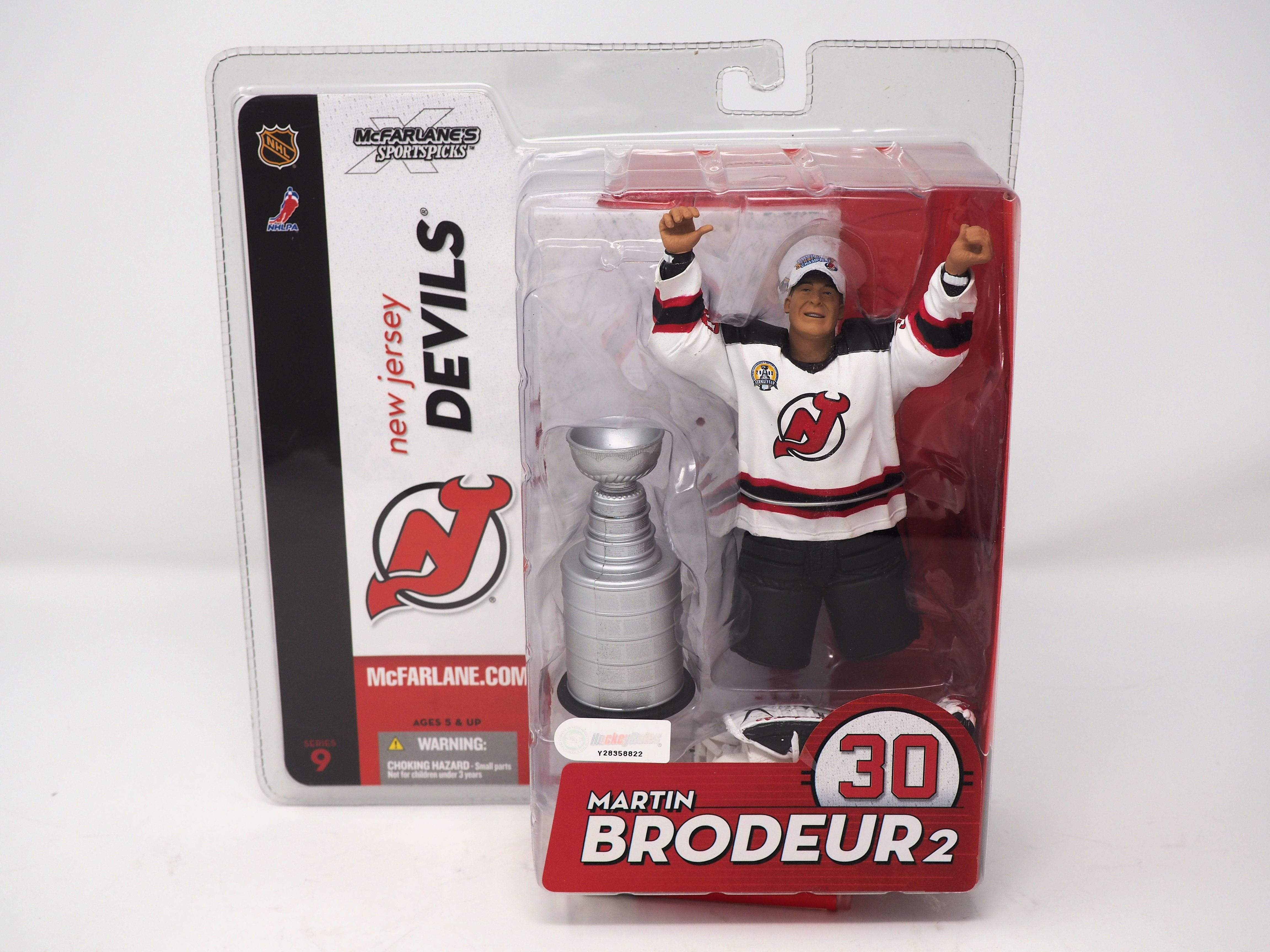 http://www.guiltypleasurecollectibles.com/cdn/shop/products/martin-brodeur-mcfarlane-new-jersey-devils-white-uniform-series-9-stanley-cup-18942538252448.jpg?v=1618563912