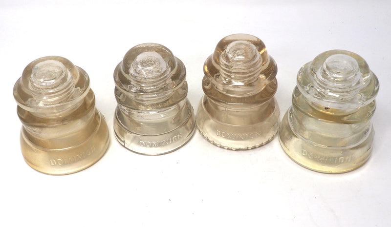 Four 4 Dominion 42 Glass Insulators No. 66, 6, 7, 8