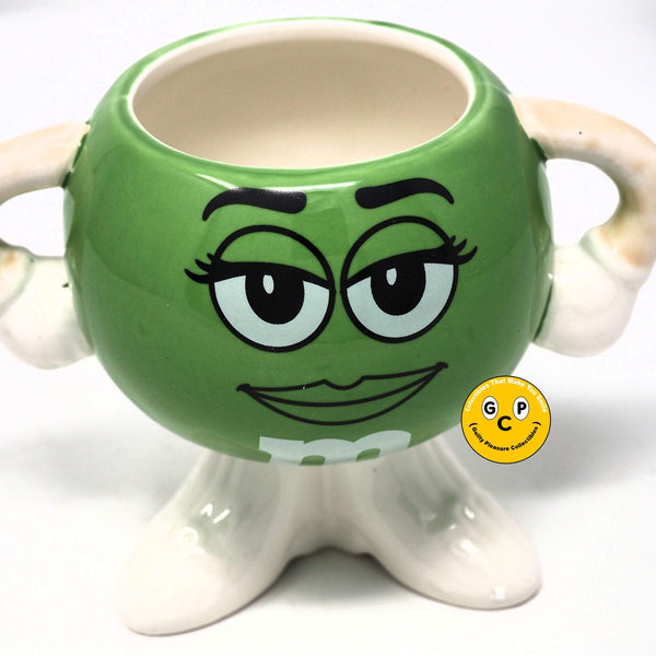 https://www.guiltypleasurecollectibles.com/cdn/shop/products/vintage-m-m-s-figural-green-mug-12-oz-355-ml-18472287666336_600x600_crop_center.jpg?v=1618616221